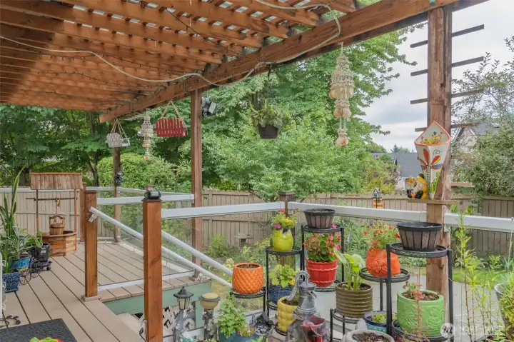 The patio offers plenty of space for potted plants, outdoor dining, or simply relaxing with friends and family—perfect for enjoying fresh air and creating your own backyard retreat.