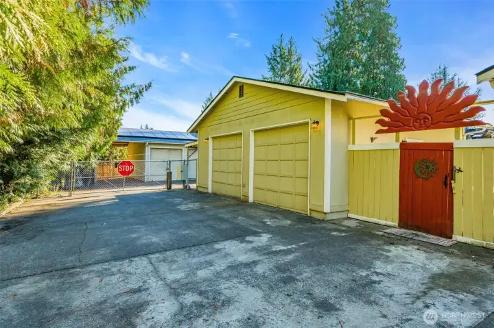 2 car garage with RV Parking and shop