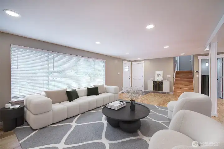 Huge windows flood the room with light