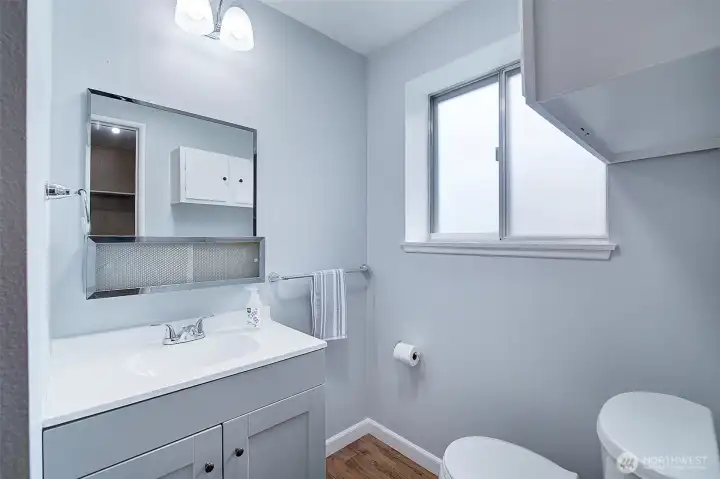 Half bath off of utility room.