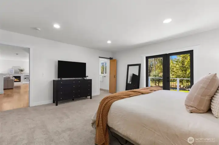 Primary suite with French doors onto deck