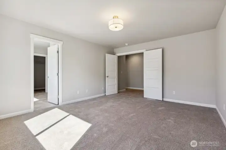 **Photos of simlar floorplan in another community. Features and specs will vary**