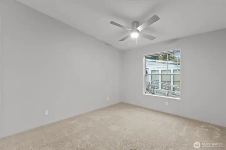 The Dining Room has vaulted ceilings and is large enough to house a 10-12 person dining room table and a Sideboard Cupboard or China Cabinet with all that wall space.  Only 1 big window but it still filters in a lot of light through into the space, among other things. Free window film with a full-price offer!