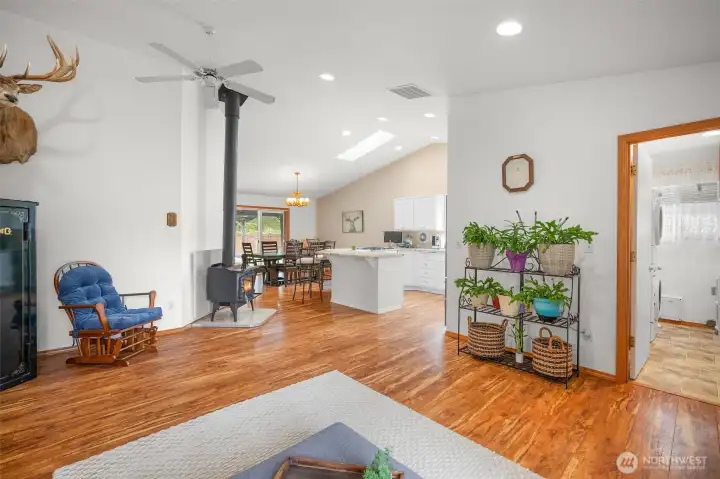 Comfort year-round with four heat sources including wood stove, gas stove, mini split A/C, and central heat.