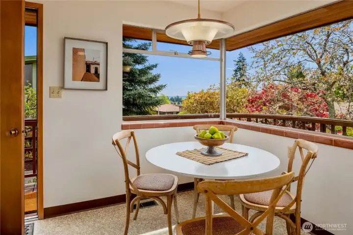 Ample space with this charming breakfast nook.