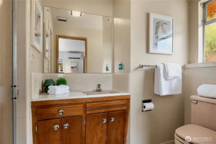 Three quarter bath in the primary bedroom.