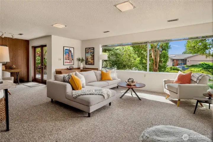 Showstopper daylight basement with huge family room and tall ceilings.