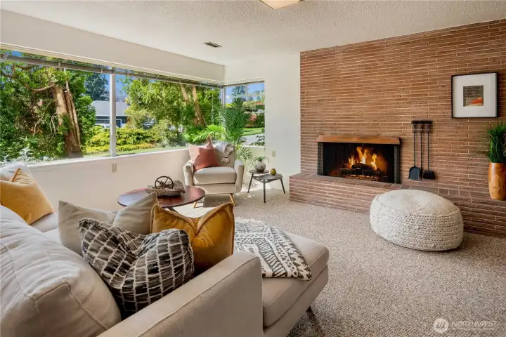Mid-century brick, wood-burning fireplace.