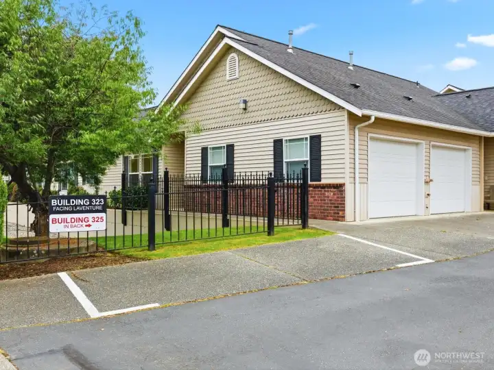 Located on the NE side of the complex, mature trees provide privacy from the street. A garage parking space and reserved spot right out front for convenient access. Located on the NE side of the complex, mature trees provide privacy from the street. A garage parking space and reserved spot right out front for convenient access.