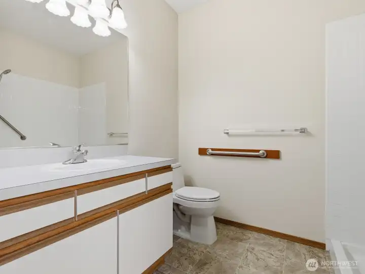 Lots of space for use of a walker if needed as well and grab bars for added safety. Lots of space for use of a walker if needed as well and grab bars for added safety.