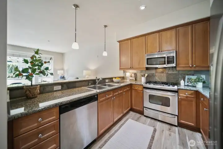 Another view of this quality kitchen with gas range.