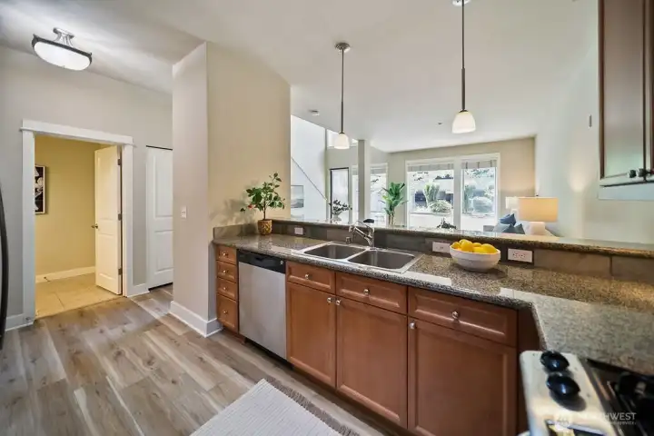 You will enjoy the natural light and chosen fixtures in this open floor plan.