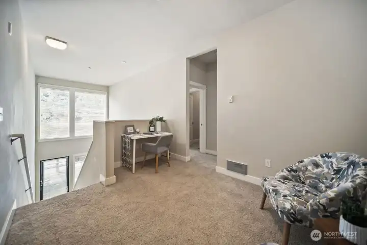 Enjoy and customize this upper level lounge area or create your own office nook as seen here.