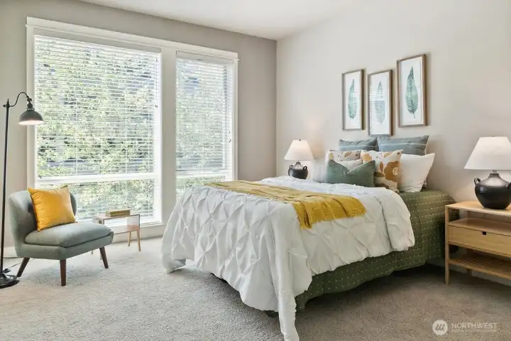 Situated to enjoy the changing foliage of the tree lined streets just outside this window.
