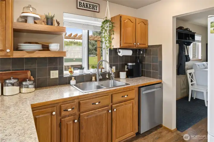 A bright workspace overlooking the property. A bright workspace overlooking the property.