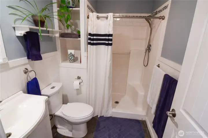 This bathroom adjoins the mud room.