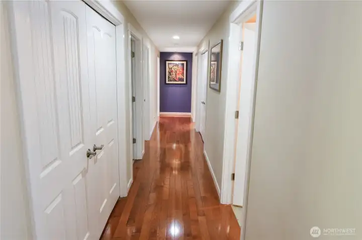 Xtra wide hallway passage leads to bedrooms and two bathrooms.