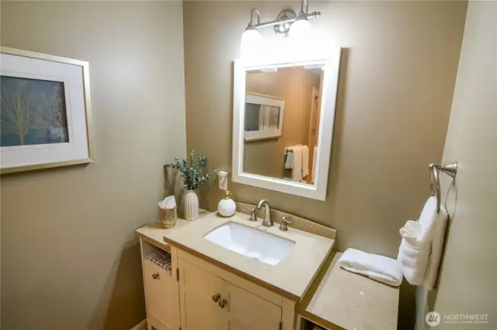 Hall bathroom showcases updated vanity, sink and storage space for you.