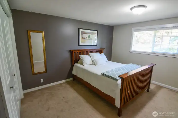 One of 4 bedrooms with generous closet space.