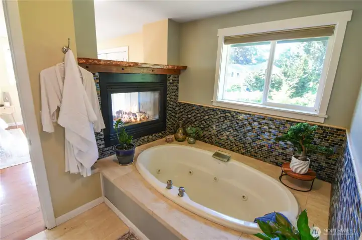 Enjoy soaking in your jetted deep tub with ambiance from your fireplace warming your bathroom. Your own private spa welcomes you at the end of a busy day.
