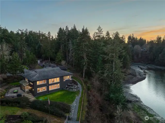 Beautiful Johnson Point home with Nisqually Reach and lagoon waterfront. Fenced 4+ acres features a diverse landscape, including gardens, an orchard, lightly forested area, patio, deck and waterfront with tidelands.