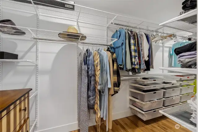 The large primary bedroom walk in closet.