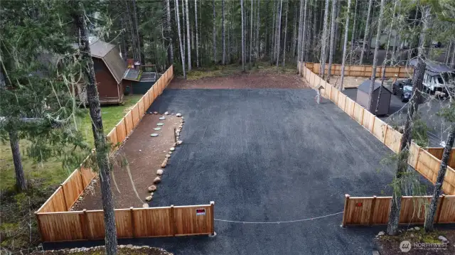 Drone close up front to back center whole property and drive