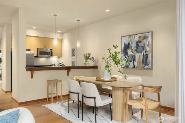 The dining room is spacious enough to accommodate a large table and chairs for entertaining.