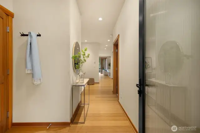 From the welcoming front vestibule, the rest of the home remains quite private. To the immediate left of the entry door, you’ll find the power room for guests. The door to the right leads to the beautiful en-suite bedroom. to the left beyond the bedroom is the flex space (used by past residents as a den, media room, overnight guest space, or office). the kitchen and great room are farthest from the door, adjacent to the private patio.