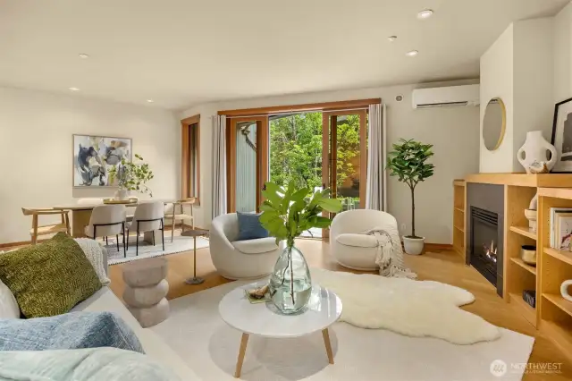 The openness of the great room provides easy living and nice connection between all the living spaces. This side is large enough to accommodate a 2nd seating area, desk, or shelving along the back wall (behind the photographer in this shot) should you wish.