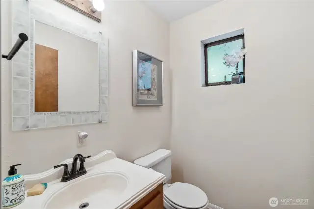 Main floor Half bath between laundry room & office.