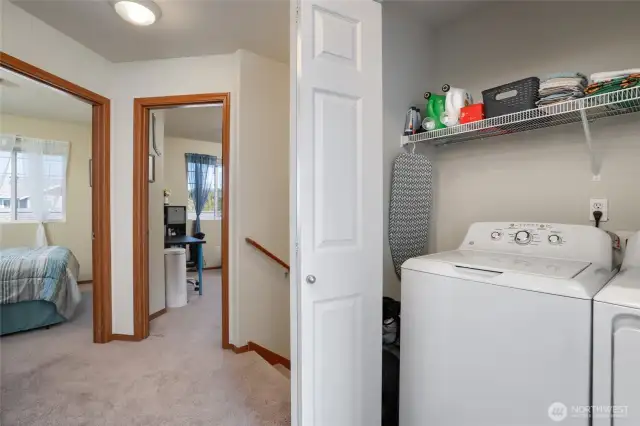 Hallway and washer and dryer space upstairs makes for easy laundry days!