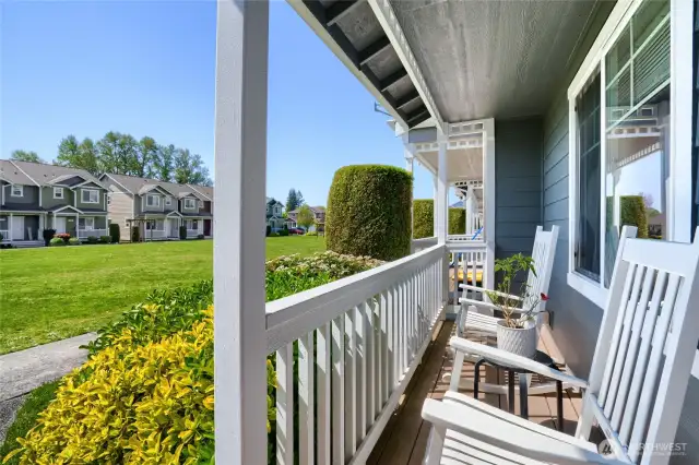 View of common area in front of home from porch.