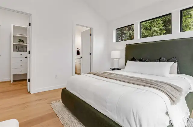 Walk-In Closet with Built-Ins, Vaulted Ceilings