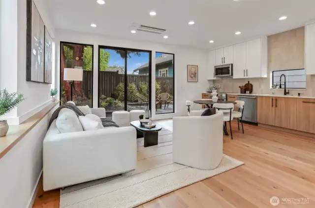 "Wall of Windows" with Oversized Sliders to Private Yard