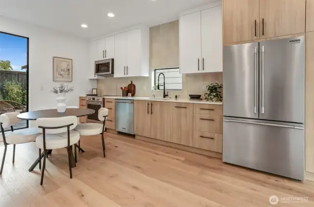 Full Kitchen Wall Providing Open, Flowing Living Space