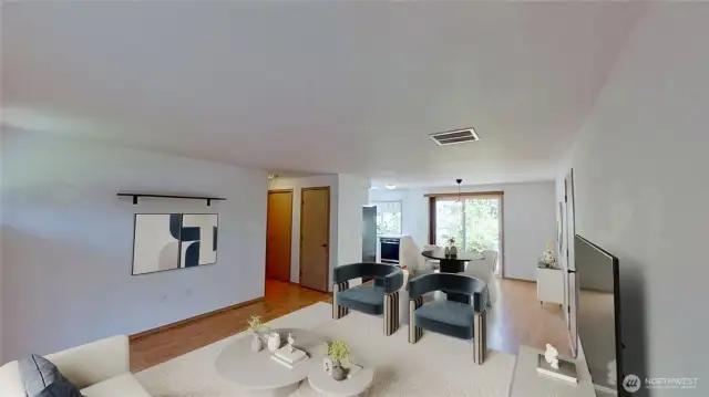 Virtually staged living room and dining area