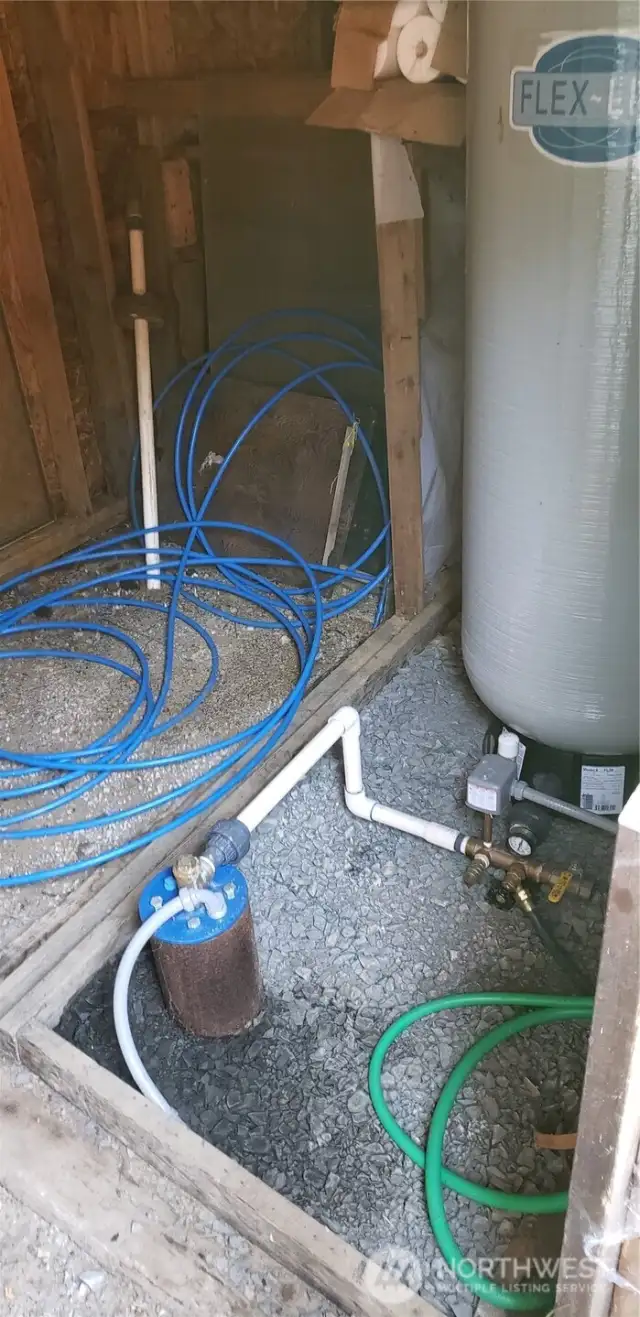Well and new pumps, pipes and expansion tank