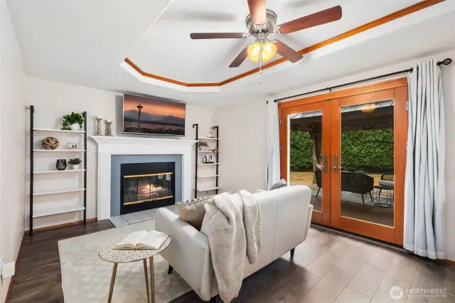 family room w/ French doors to outdoor deck