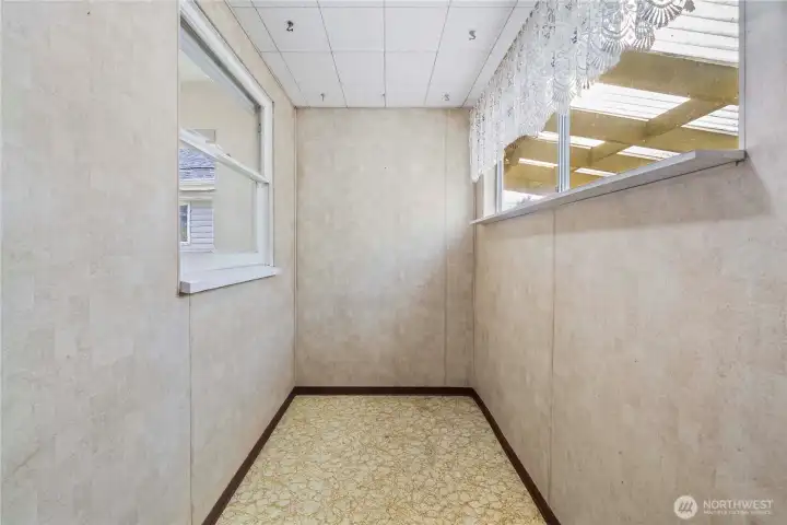 Laundry room? New stairs to attic?