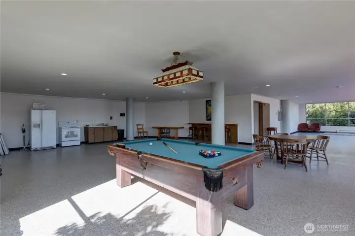 Having a party or event?  This is the community rec room. Tables, chairs,bar and kitchen.