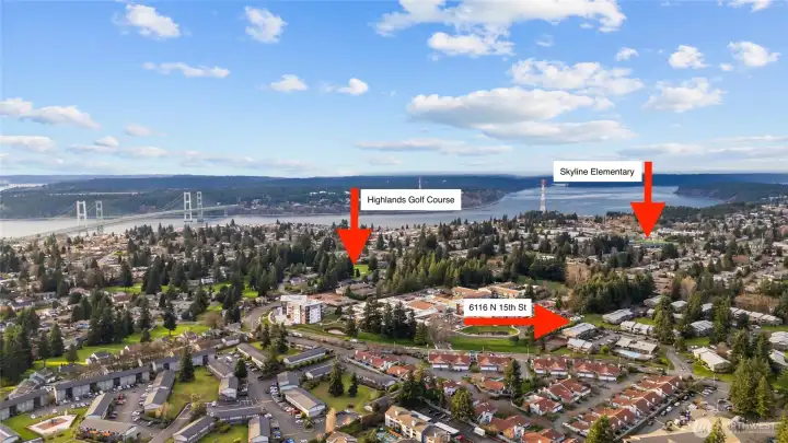 This view captures how close in proximity these conveniences are, the waterfront, Highlands Golf Course, and the nearby elementary school, all just a moment away.