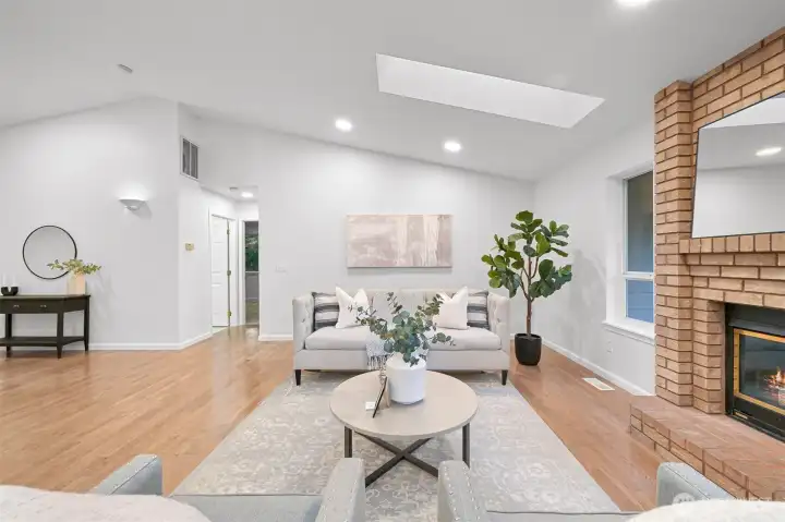 Natural light abounds thanks to the skylight and ample windows.