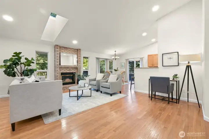 The living room, dining area, and breakfast bar all meet for an easy flow.