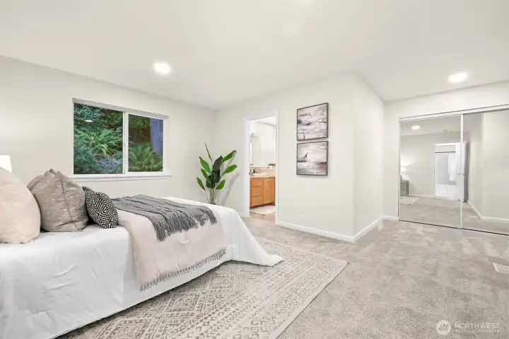 Primary bedroom features a roomy closet nook.