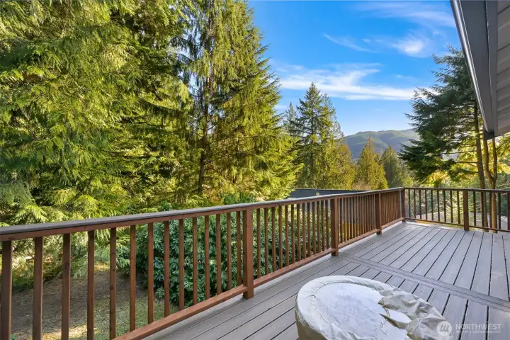 Sip morning coffee from your peaceful and sunny deck with a view!