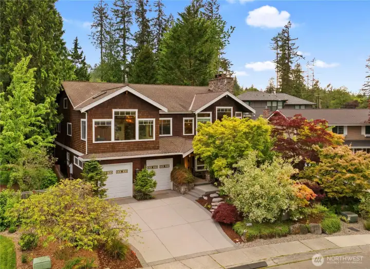 Perched up slightly above the street for even better light and privacy in this highly desired neighborhood.