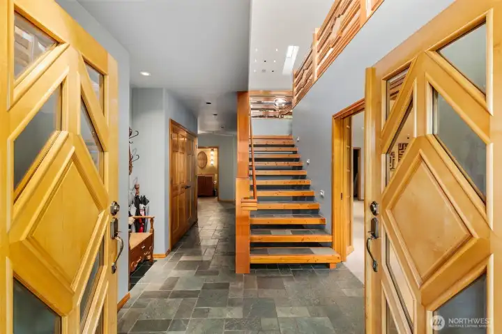 Inside your French doors to your entryway with a landing area, ample coat & shoe storage. Living rom to your right, amazing main level up.