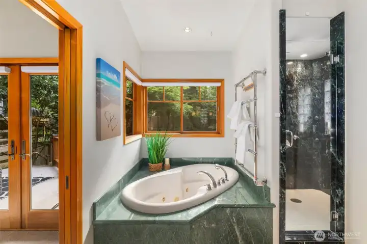 Soak in your tub overlooking your garden space in privacy and great light!