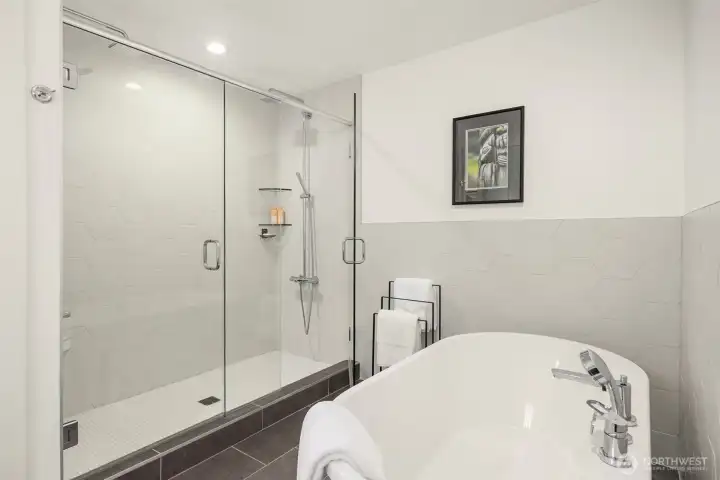 Soaking Tub and Generous Shower.
